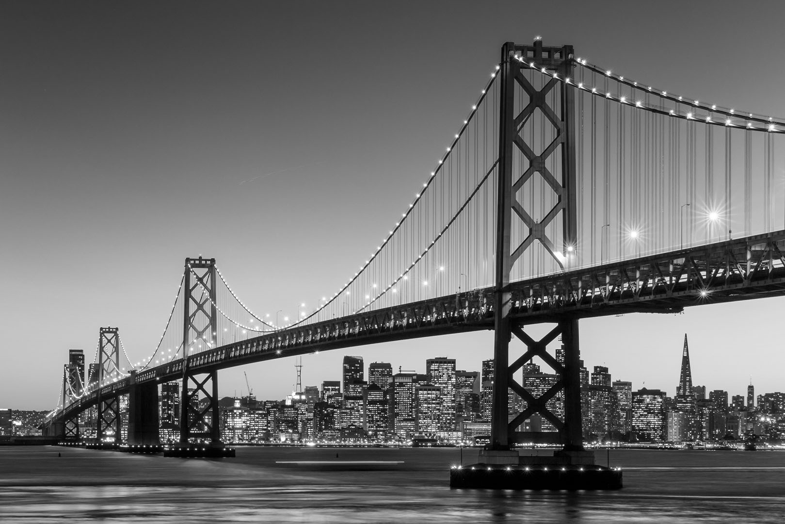 san,francisco,skyline,and,bay,bridge,at,sunset,in,black
